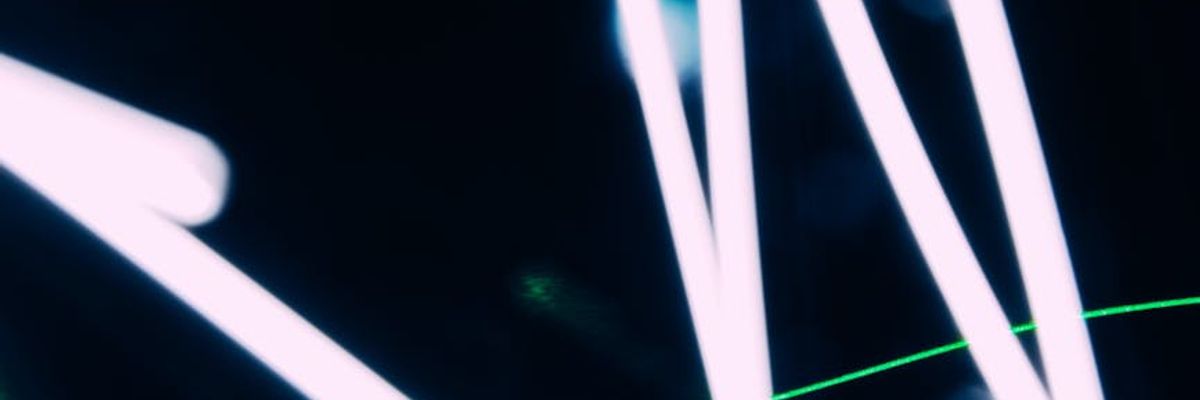 Abstract neon grid representing interconnected life paths