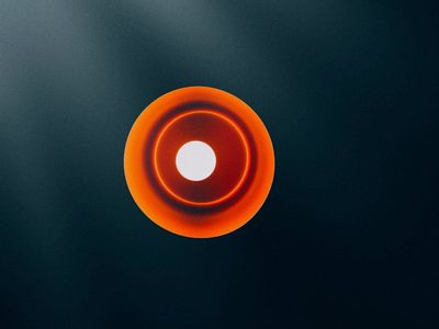 Concentric glowing circles in dark void